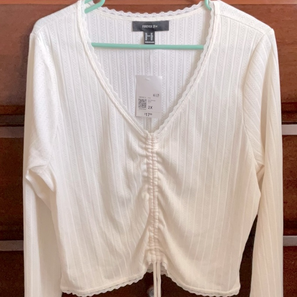 Forever21 ivory color long sleeve knit top.  Size 2x